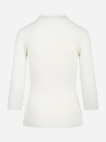 Polo bianca in maglia a micro trecce