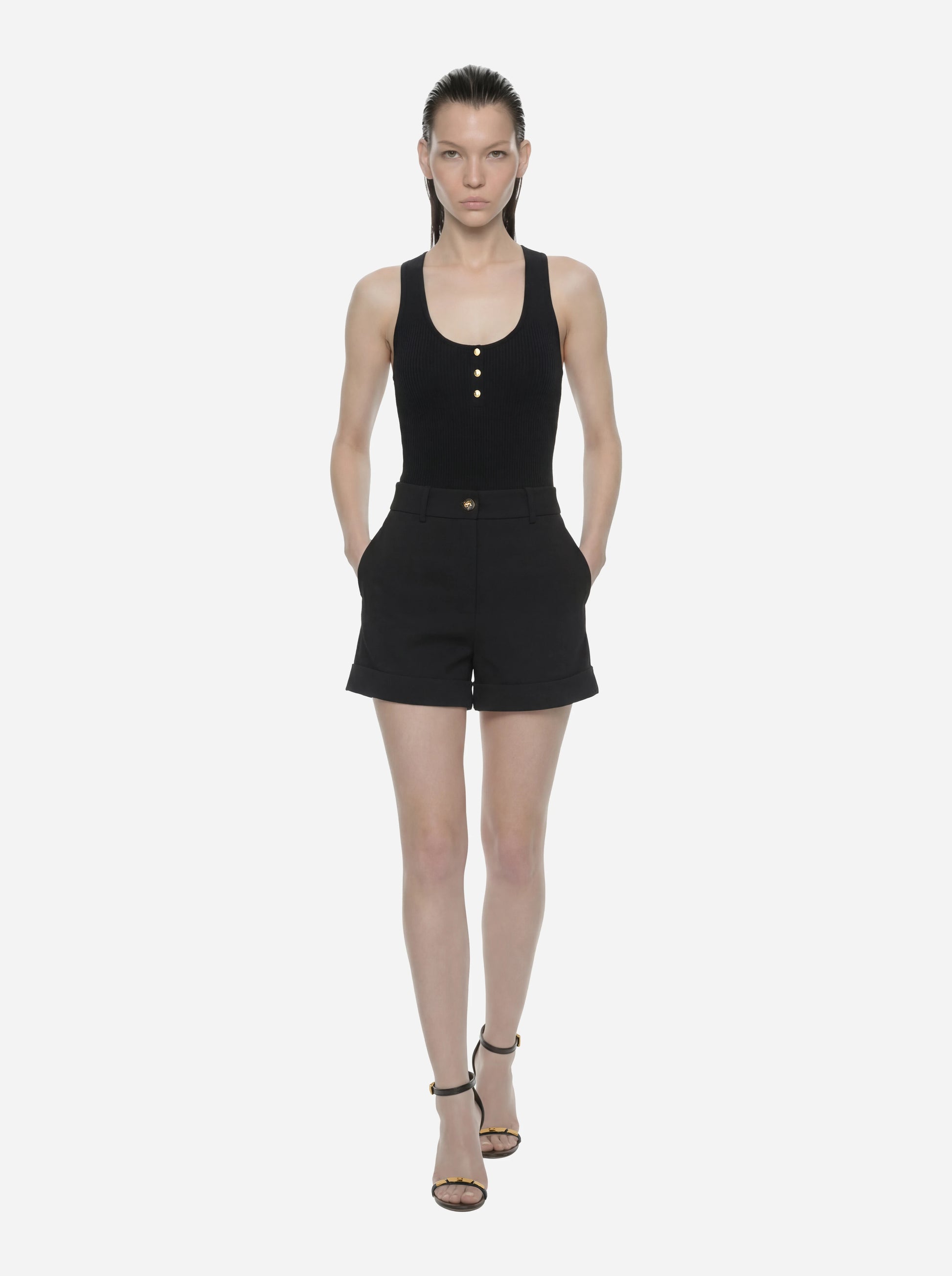 Top in maglia nero a micro trecce