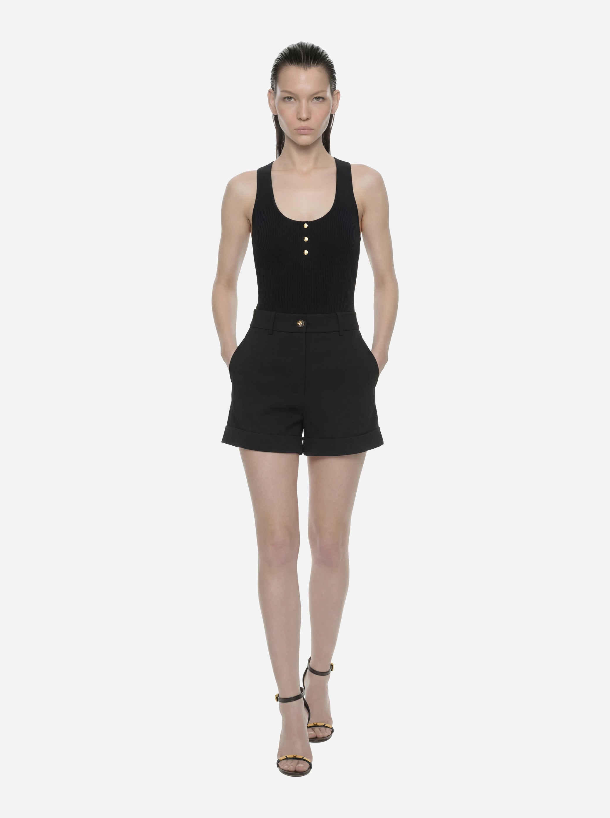 Top in maglia nero a micro trecce
