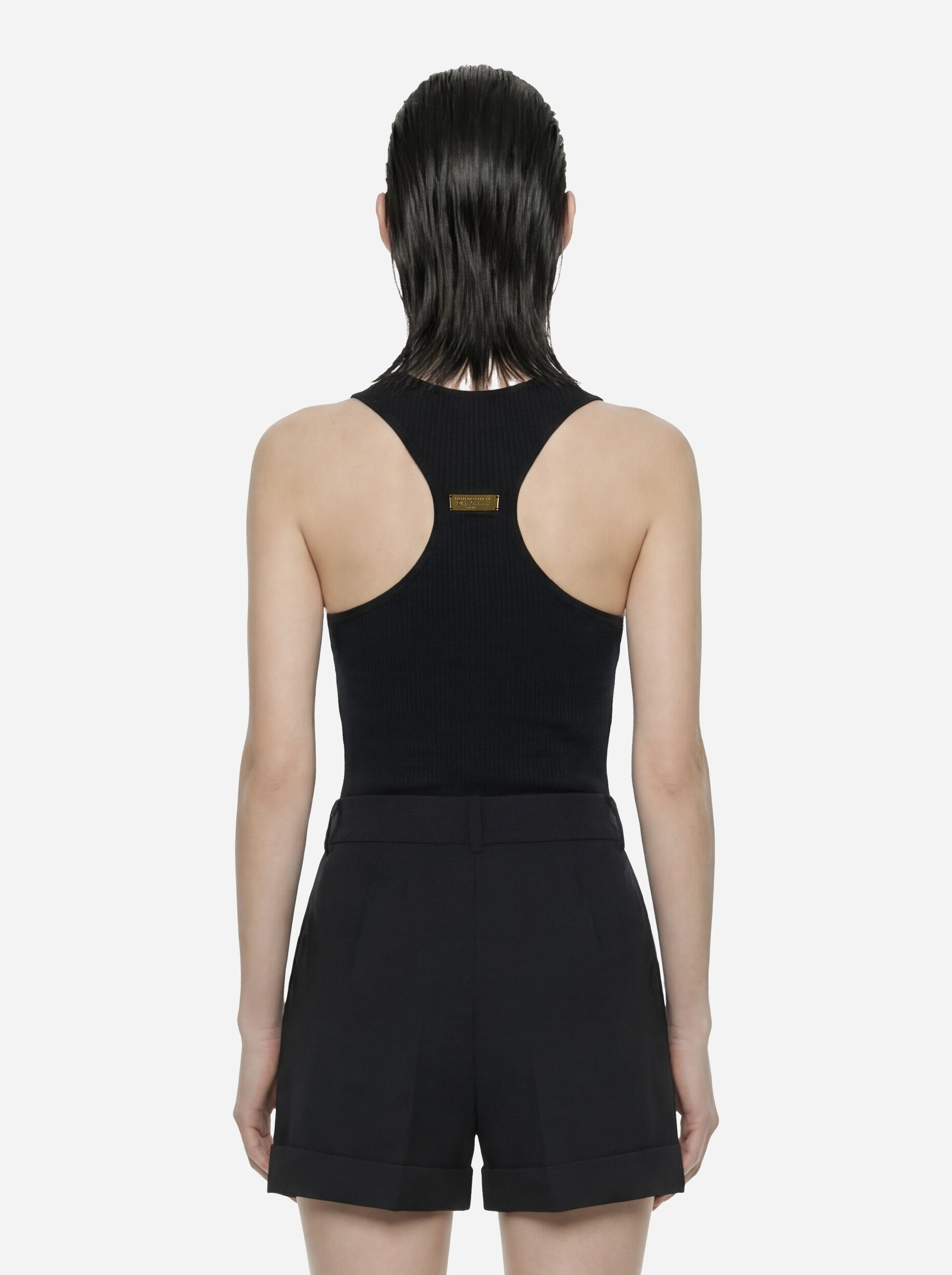 Top in maglia nero a micro trecce