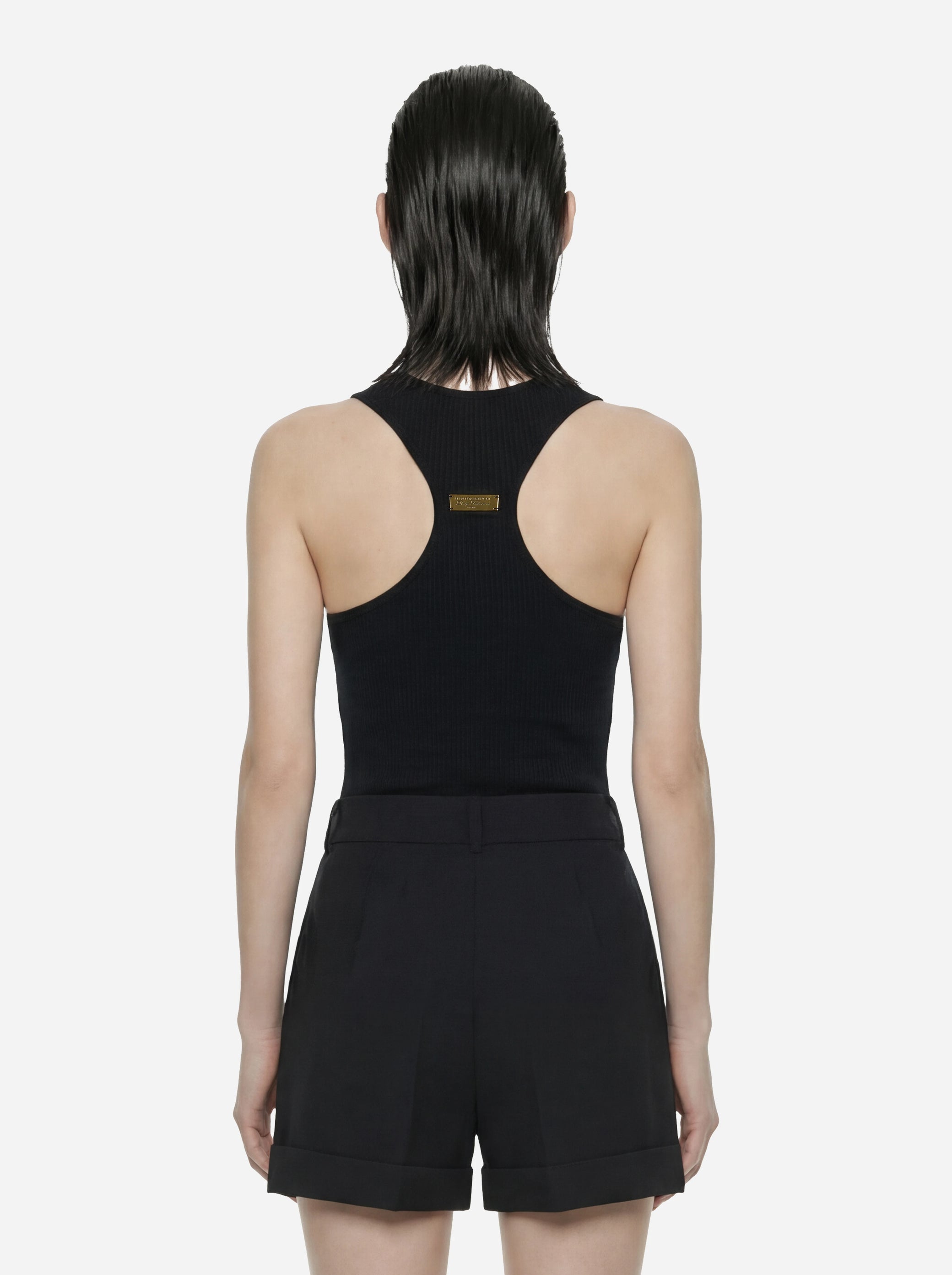 Top in maglia nero a micro trecce