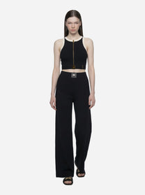 Pantalone in maglia nero con bande in viscosa lucida
