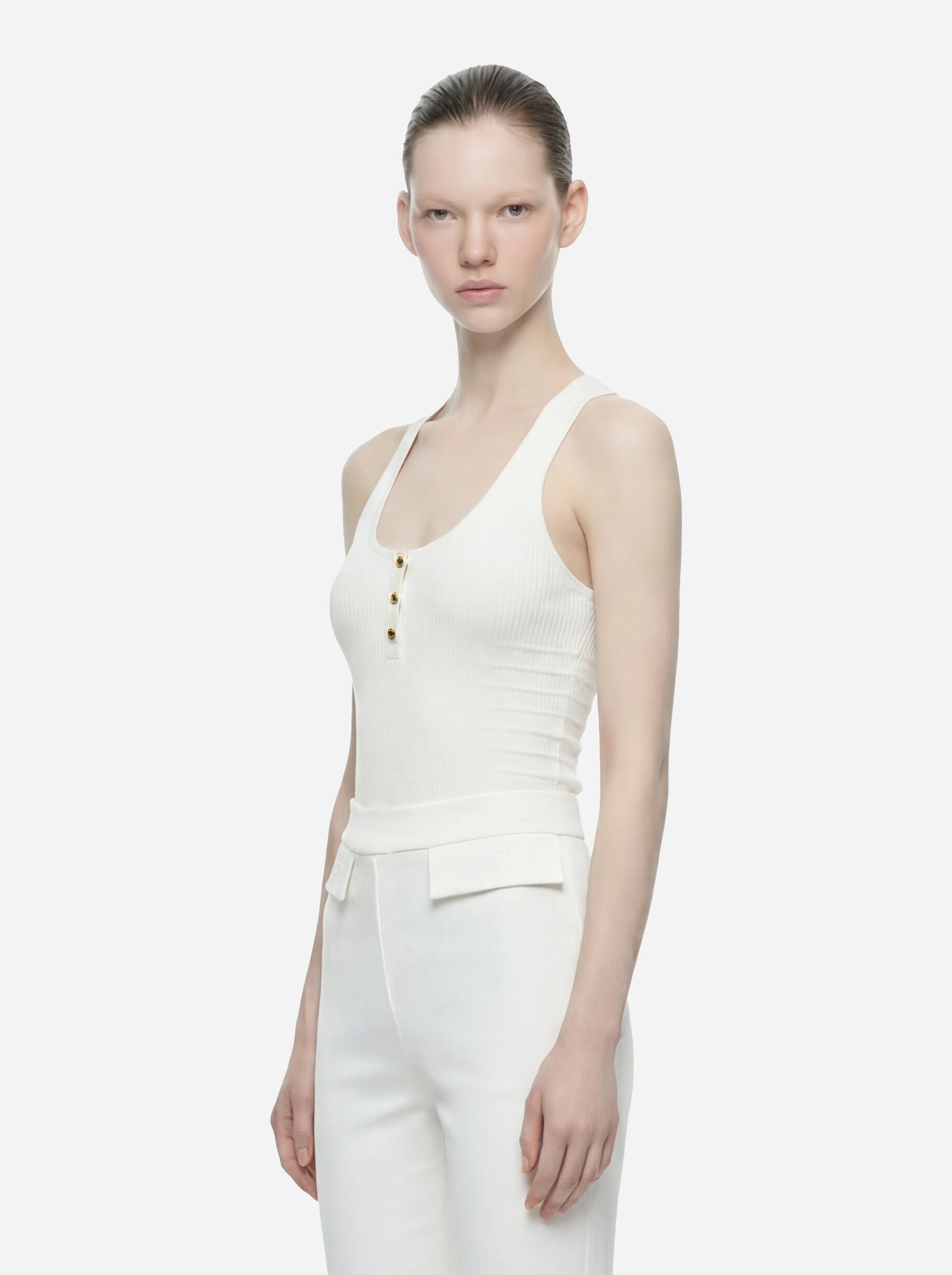 Top in maglia bianco a micro trecce