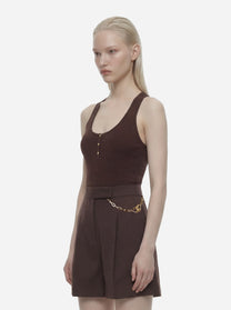 Top in maglia marrone a micro trecce