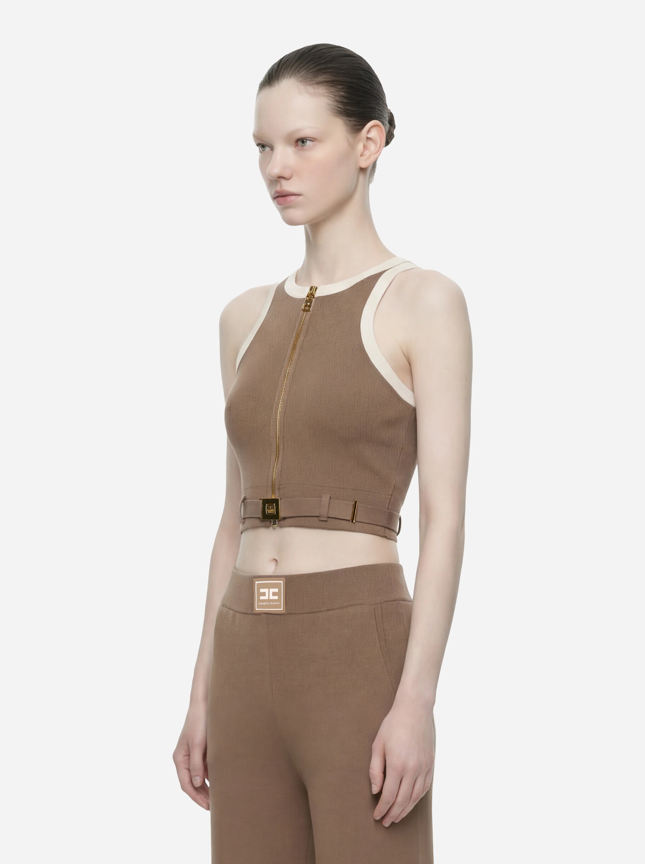 Top in maglia beige con bande in viscosa lucidacon cintura