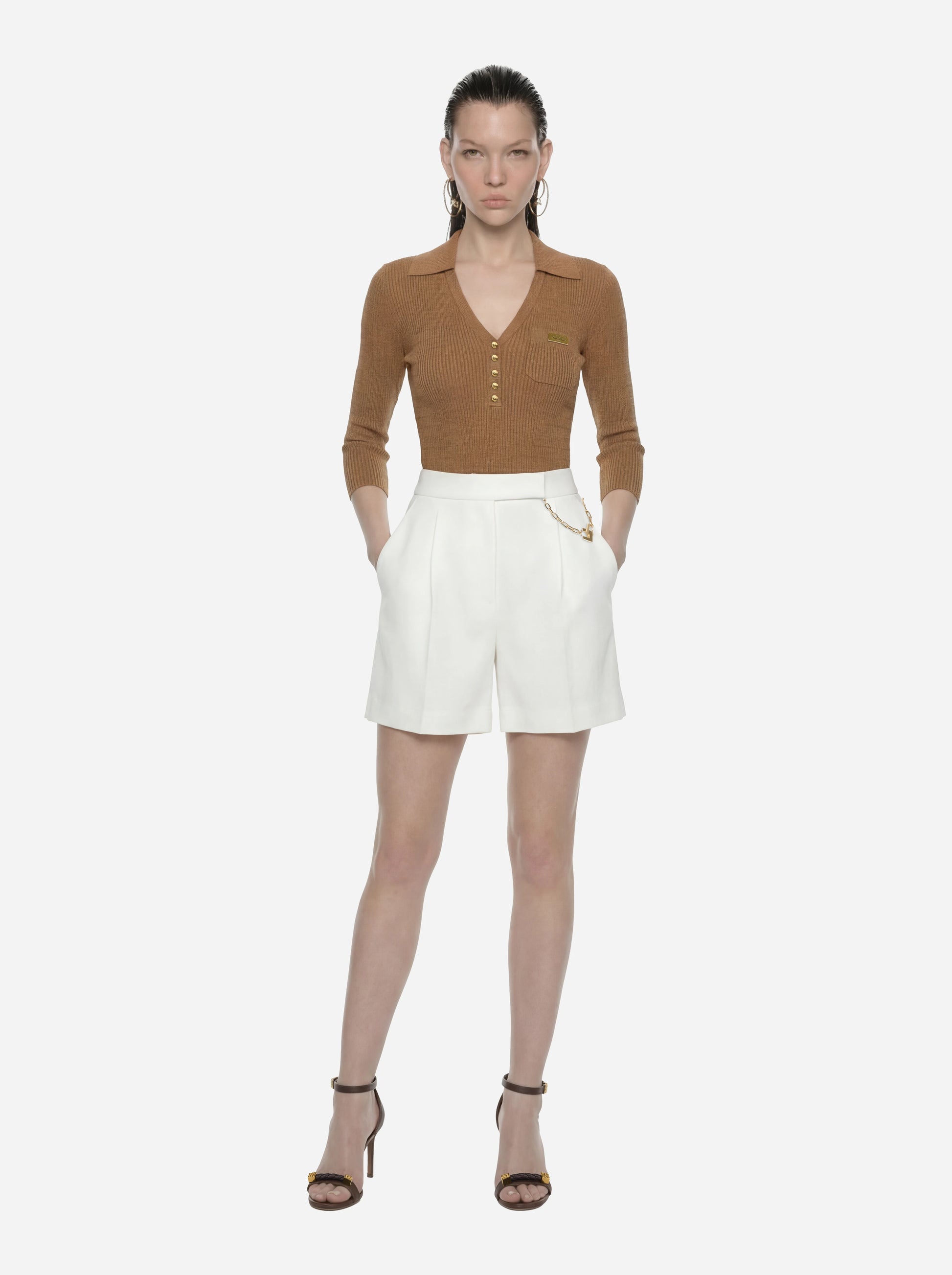 Polo beige in maglia a micro trecce