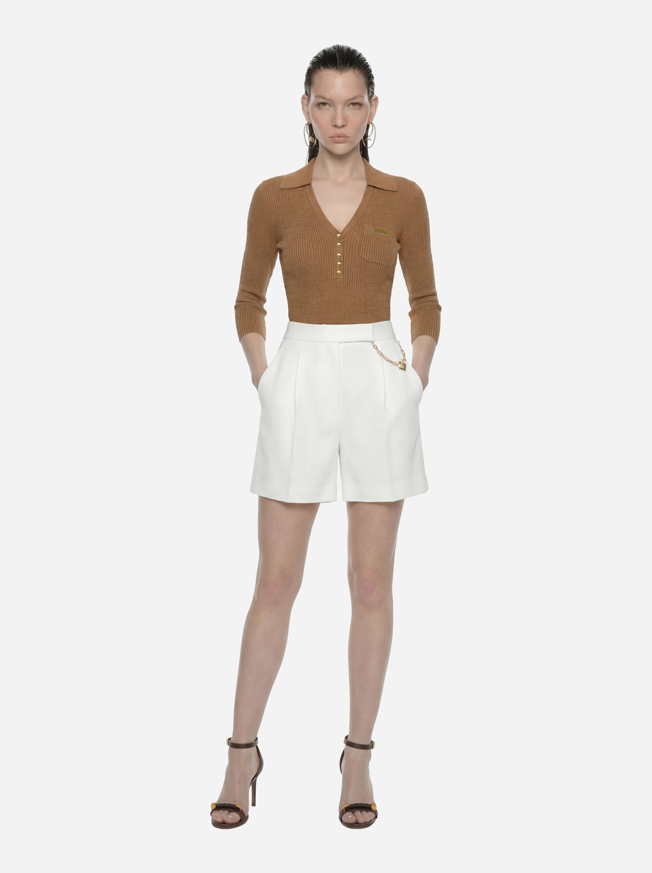 Polo beige in maglia a micro trecce