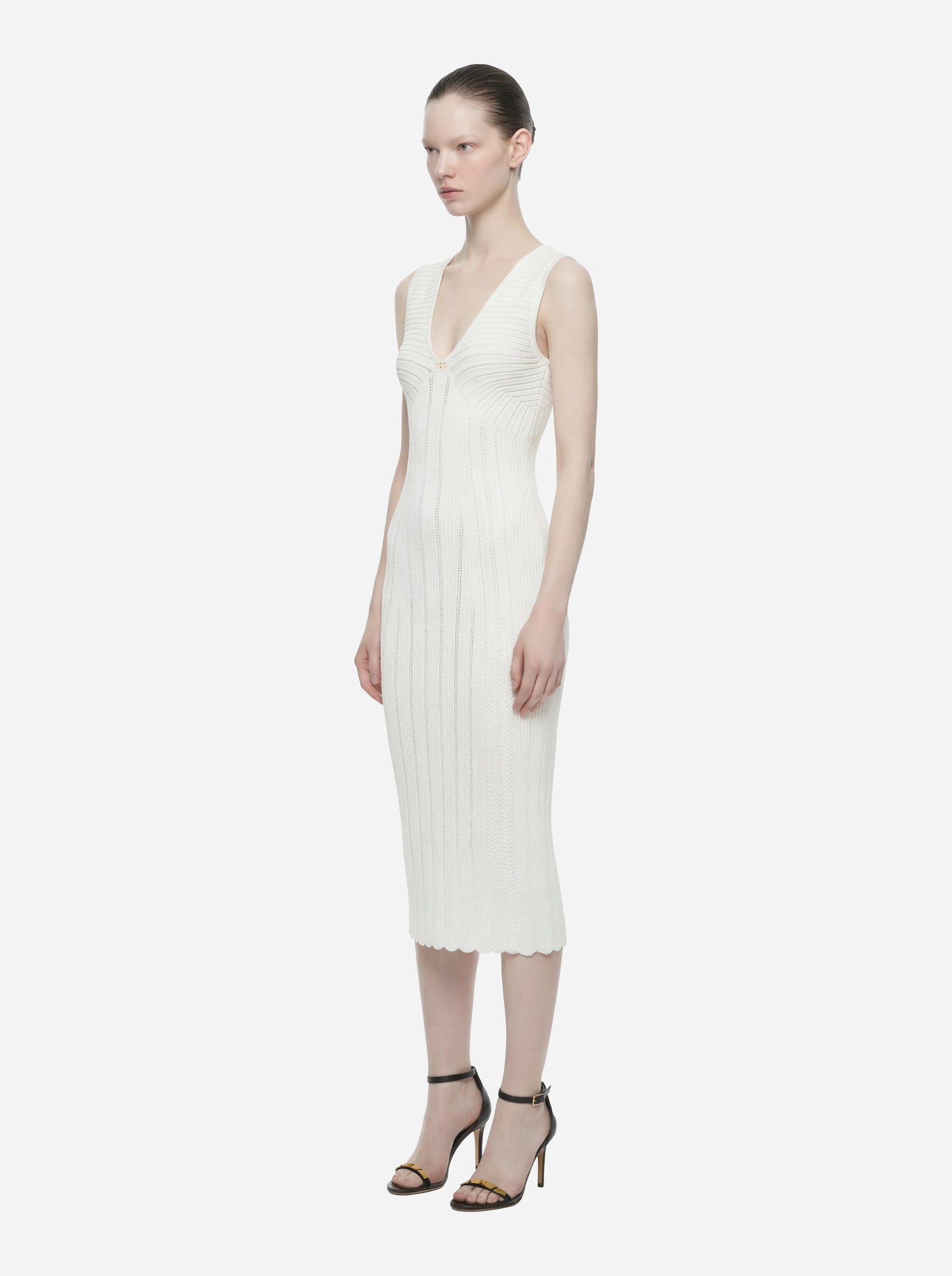 Abito bianco in maglia a jour
