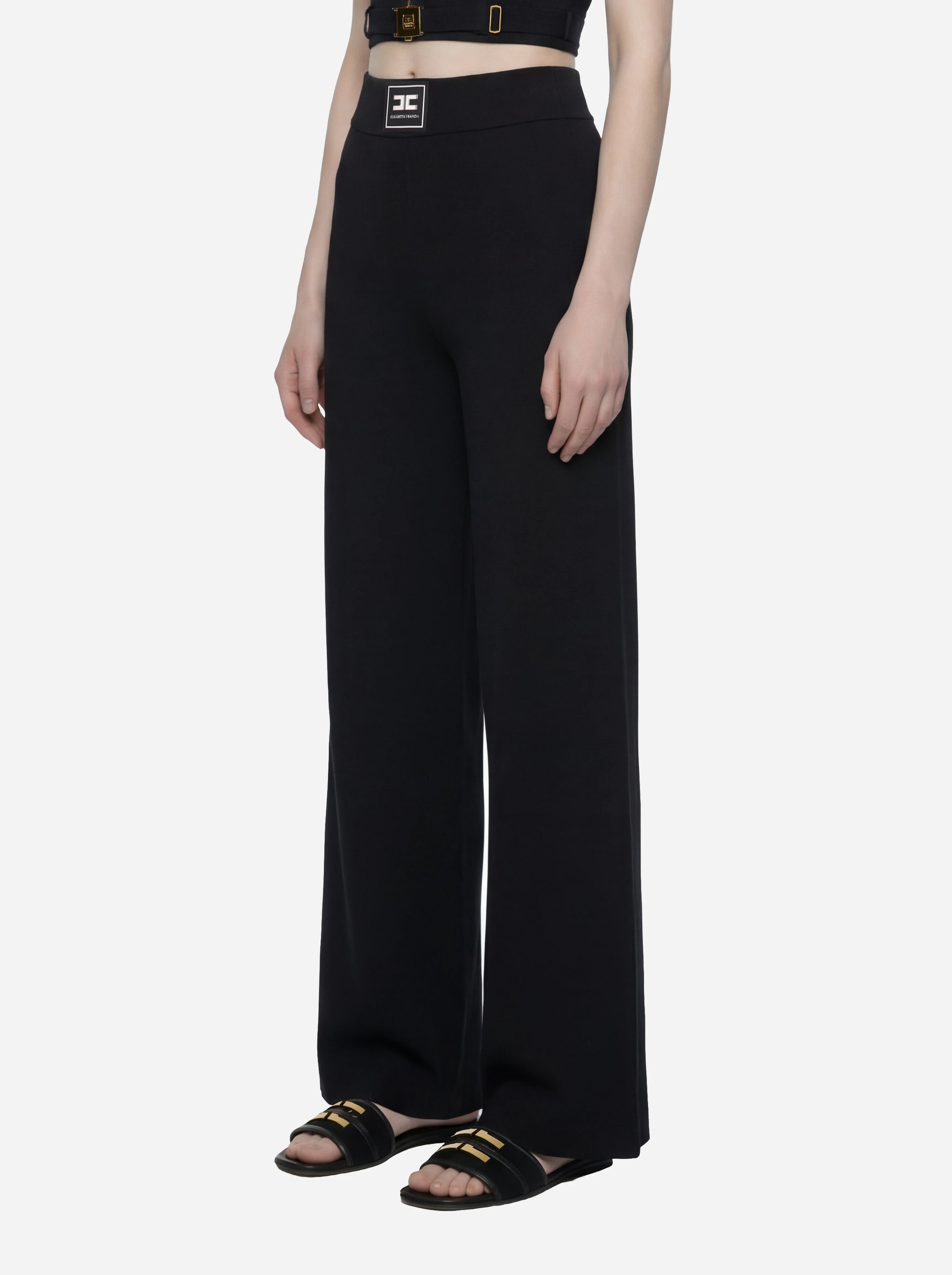Pantalone in maglia nero con bande in viscosa lucida