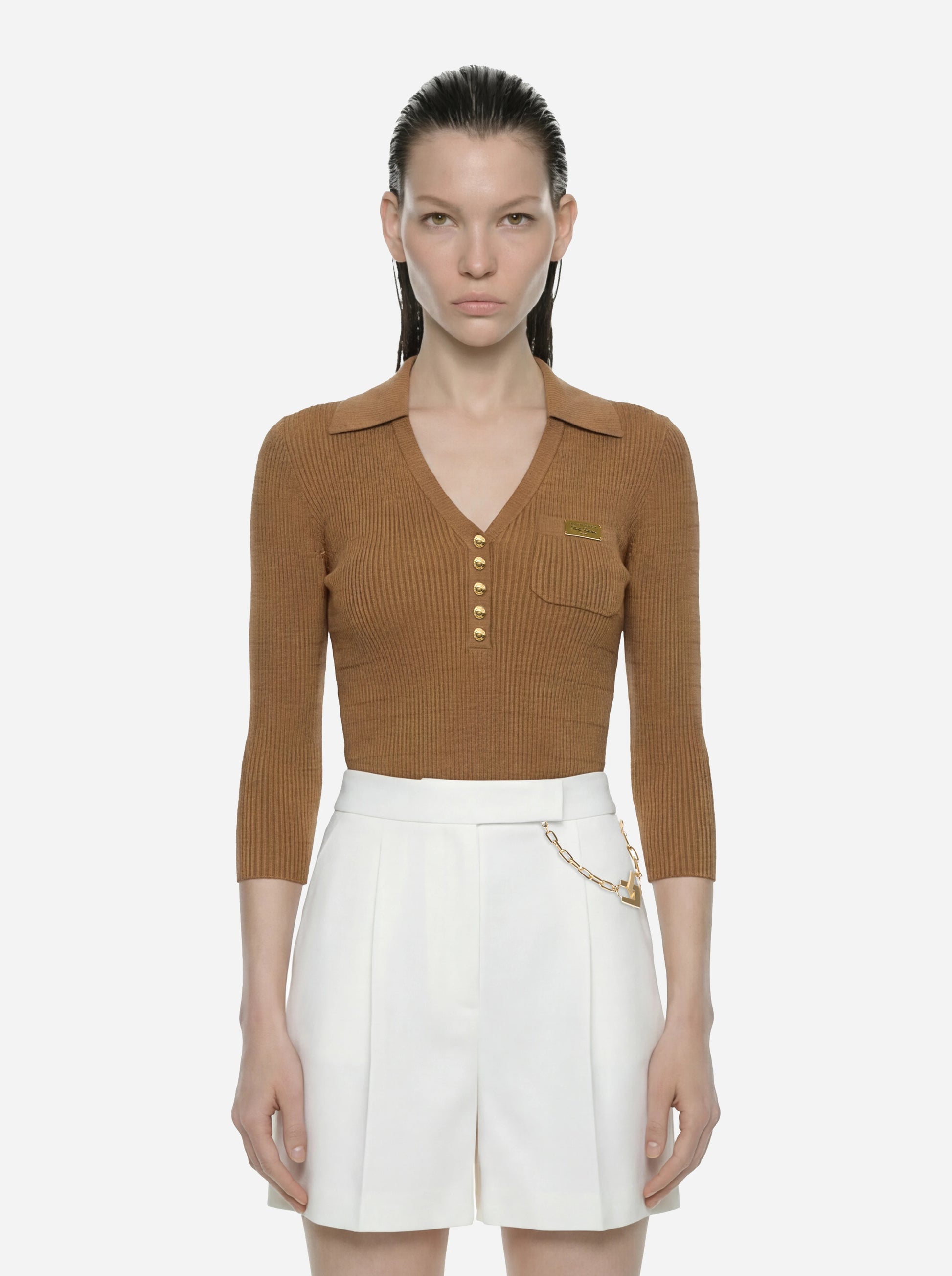 Polo beige in maglia a micro trecce
