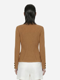 Giacca in maglia beige con bottoni gioiello