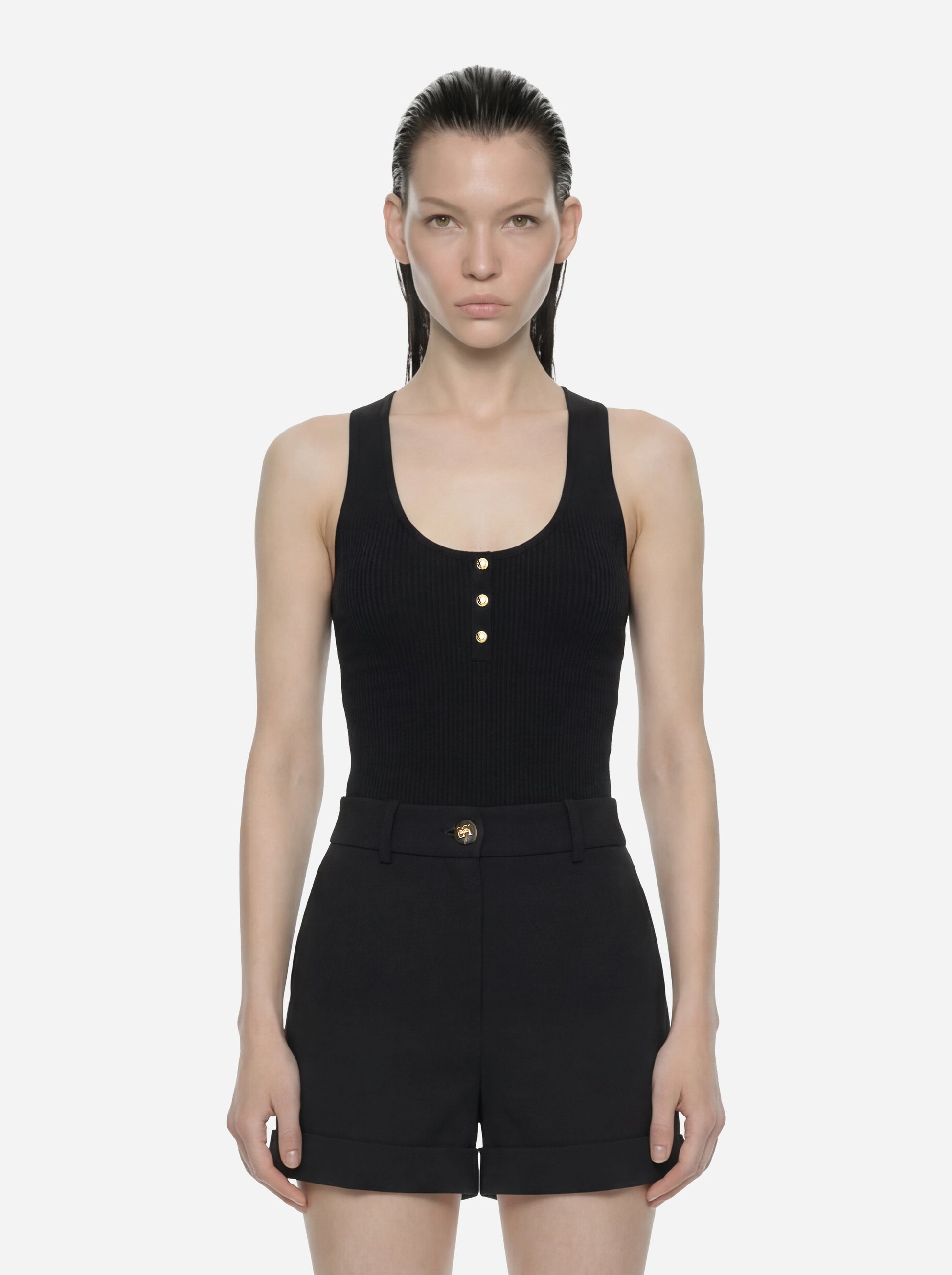 Top in maglia nero a micro trecce