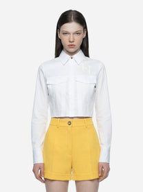 Camicia in cotone bianco con patte e ricami