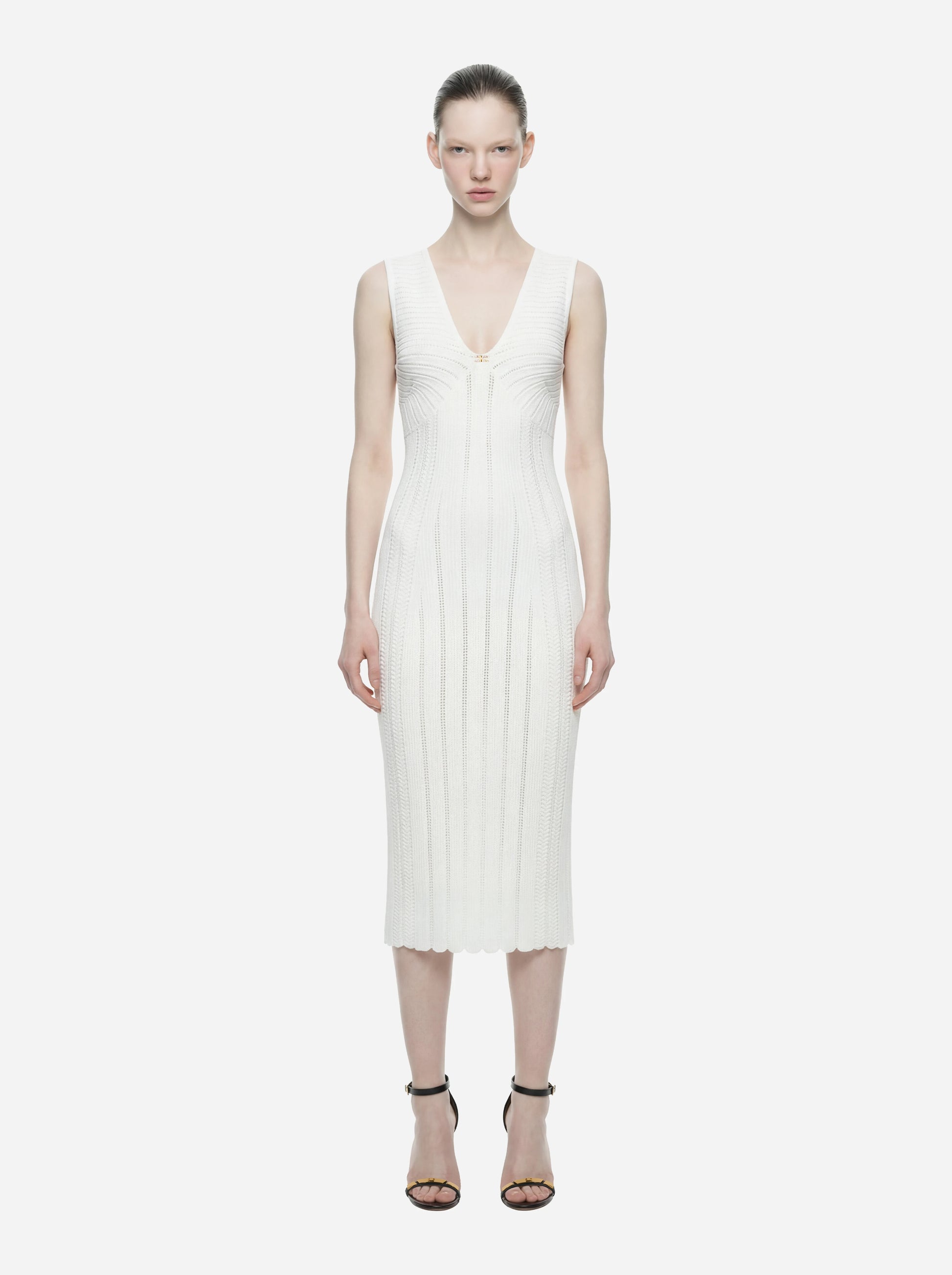 Abito bianco in maglia a jour