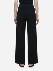 Pantalone in maglia nero con bande in viscosa lucida