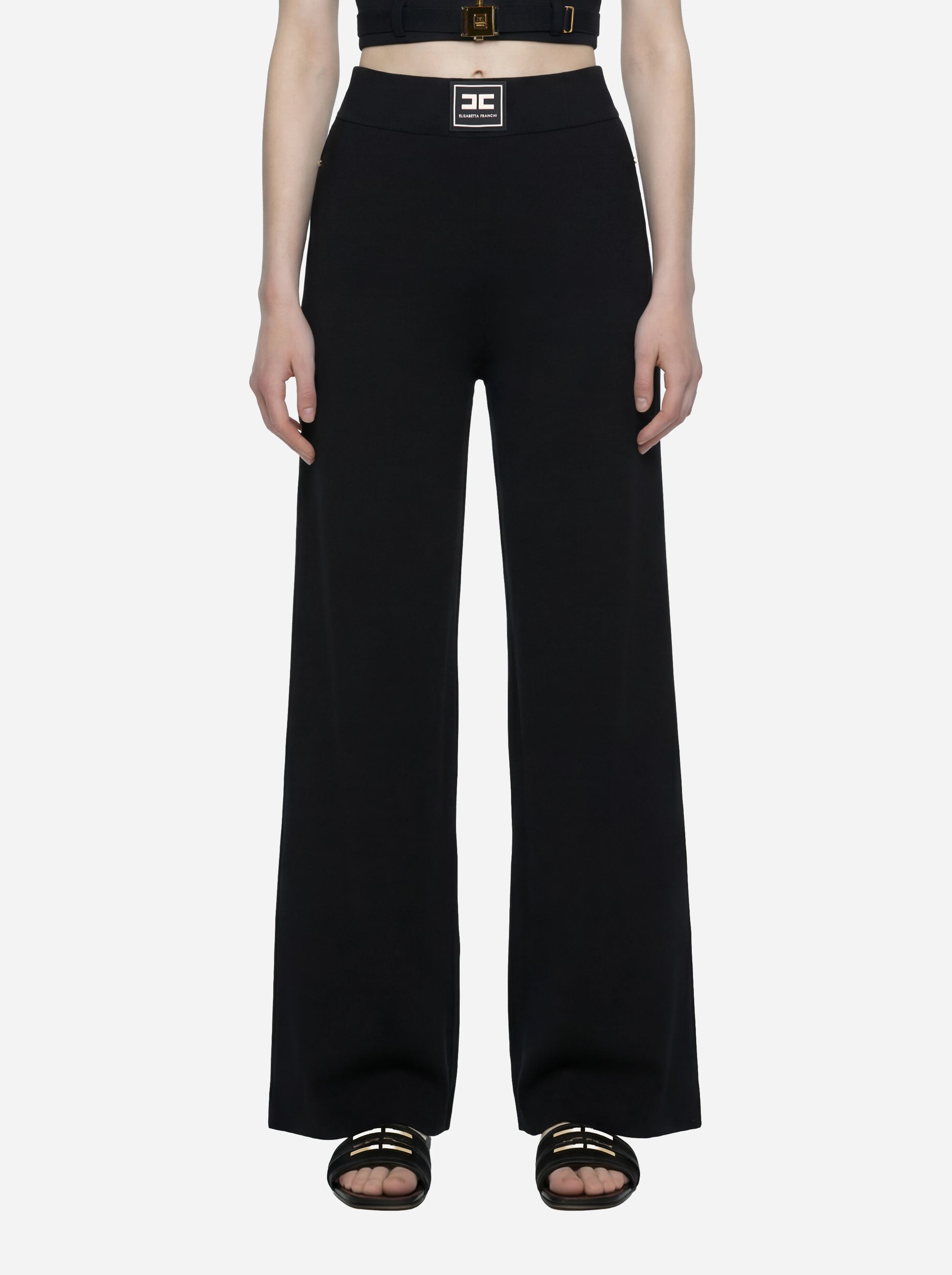 Pantalone in maglia nero con bande in viscosa lucida