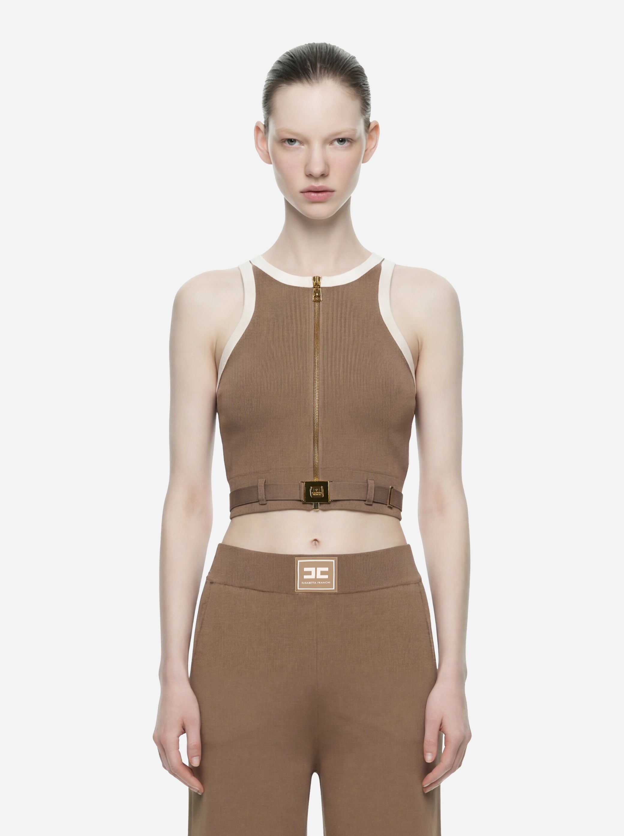 Top in maglia beige con bande in viscosa lucidacon cintura
