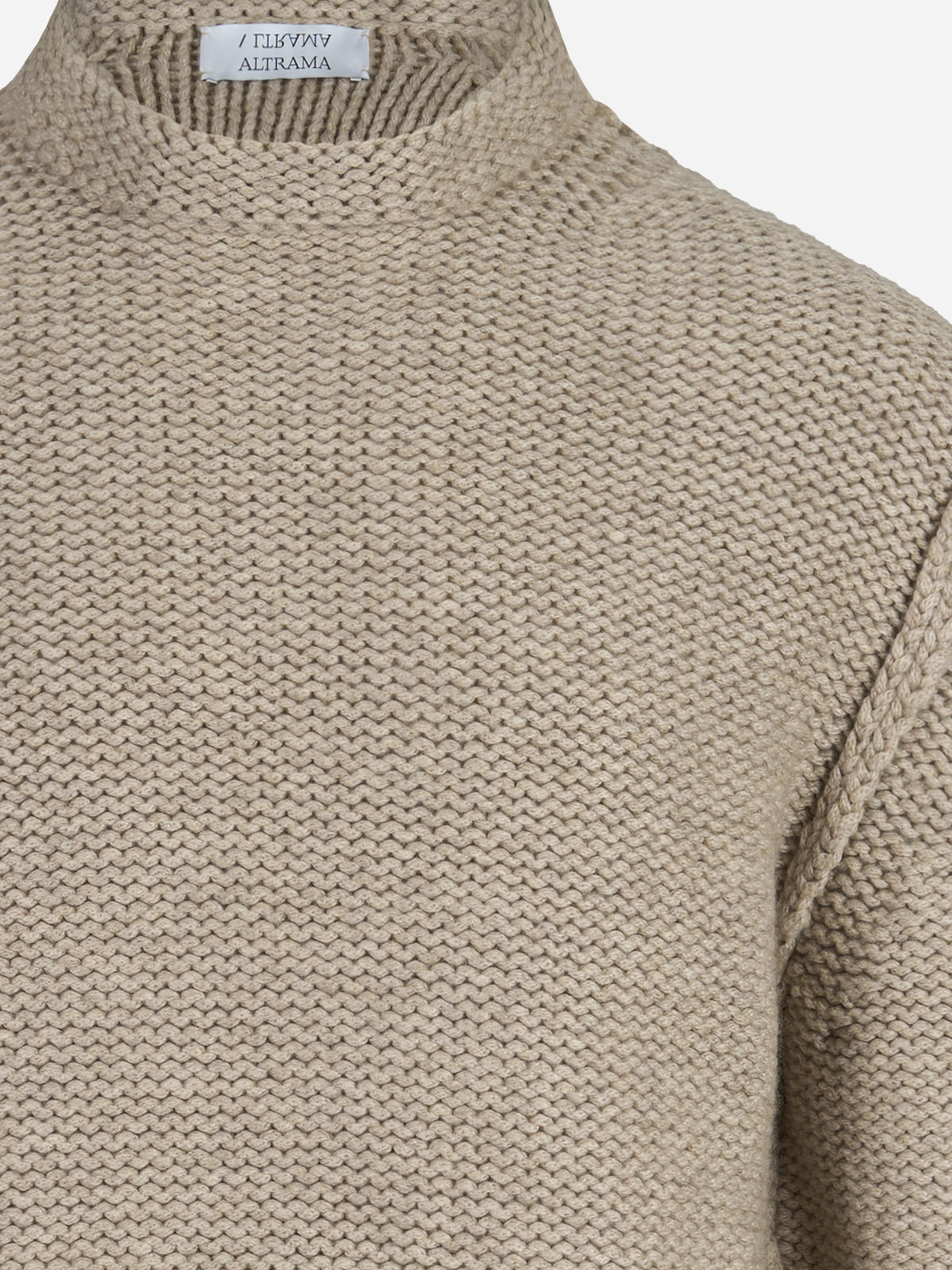 Maglia in cashmere a collo alto beige - dettaglio del capo