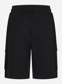 Shorts in jersey nero con tasche