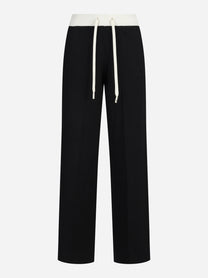 Pantaloni in maglia con logo neri e burro - vista frontale