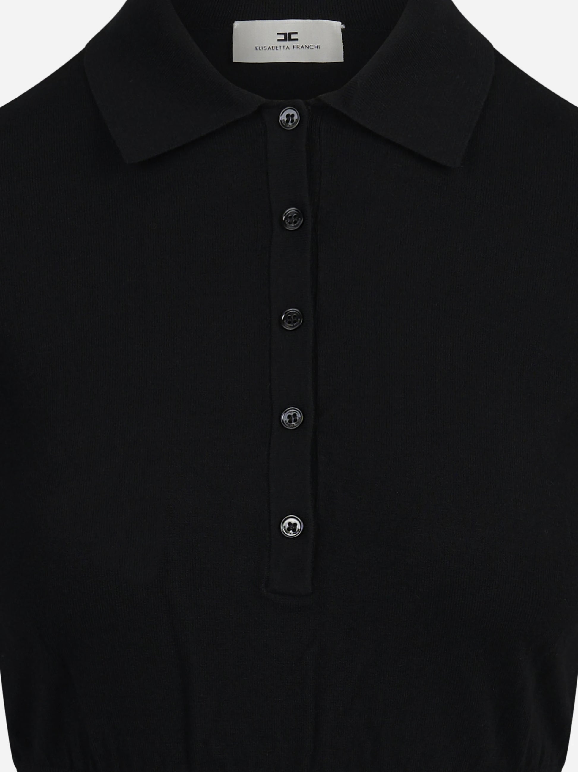 Polo aderente in maglia nera - dettaglio prodotto